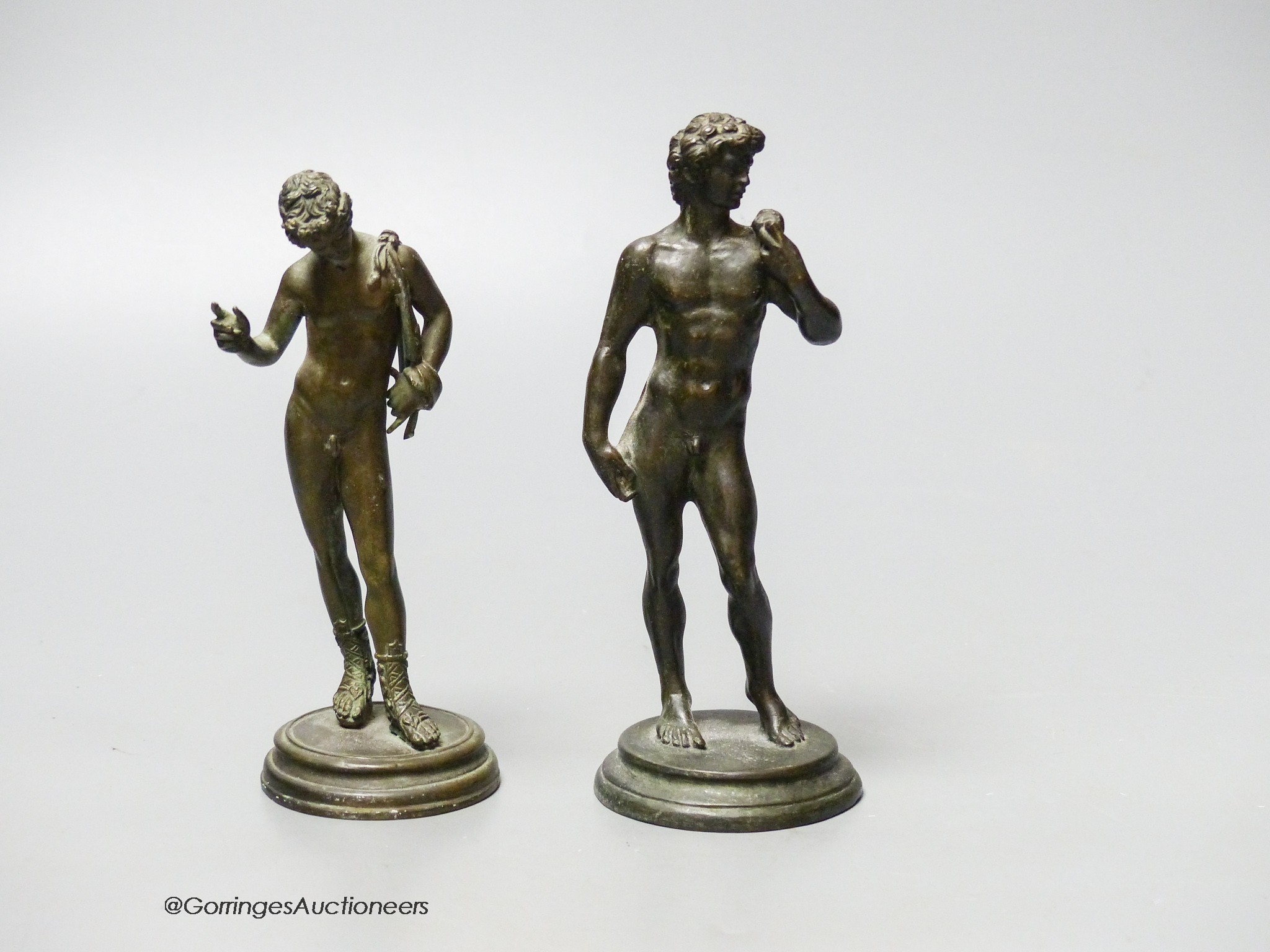 Two 19th century bronze figures, after the Antique, of David and another, tallest 14cm